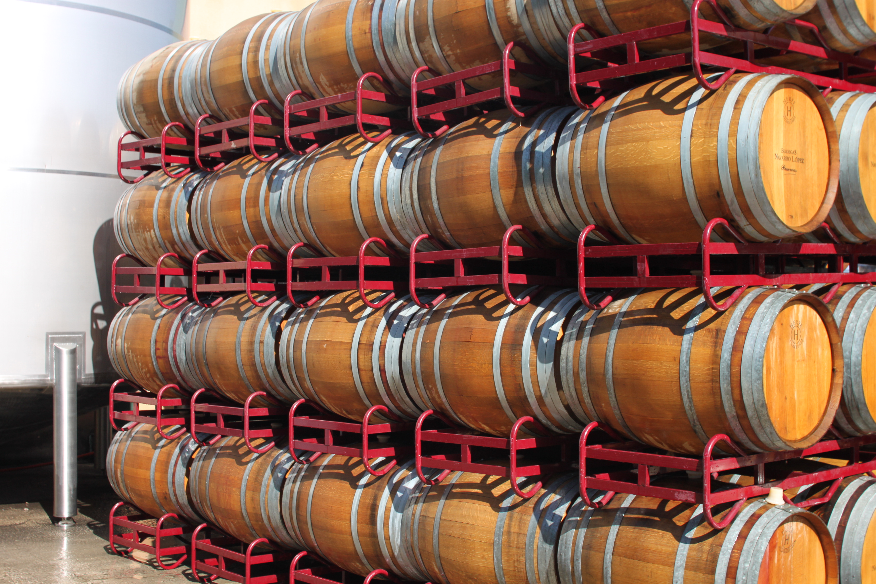 Wine barrels aging in our cellar